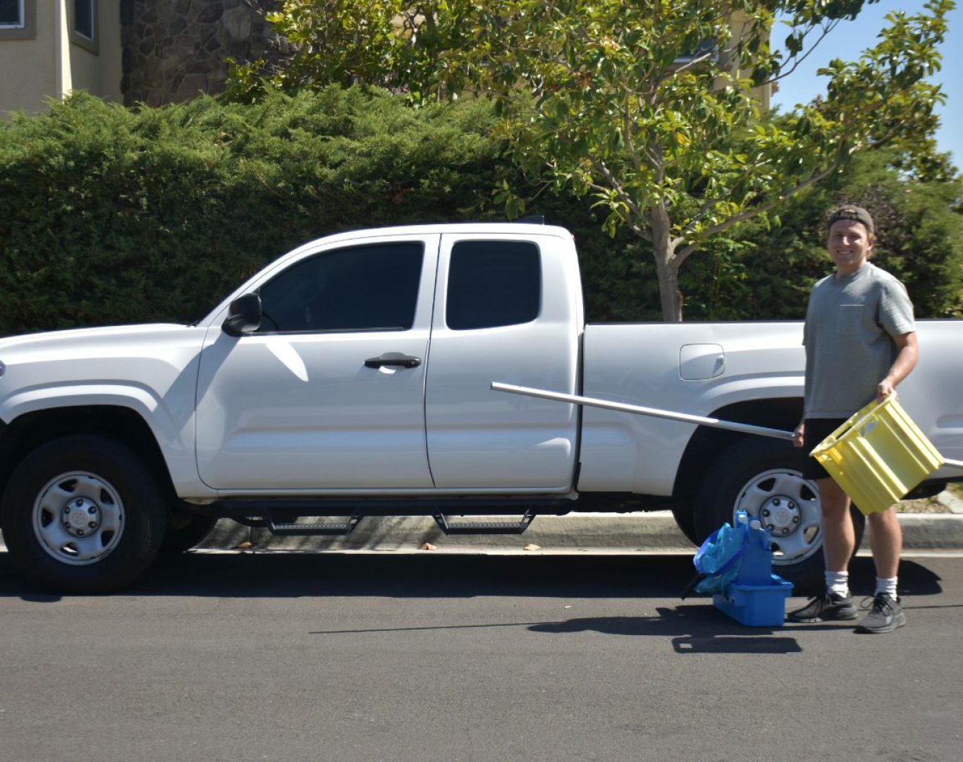 A Pool Service and Repair expert performing pool cleaning service in Yorba Linda, CA, ensuring customer satisfaction through reliable and detailed care. Pool Cleaning Service near me.