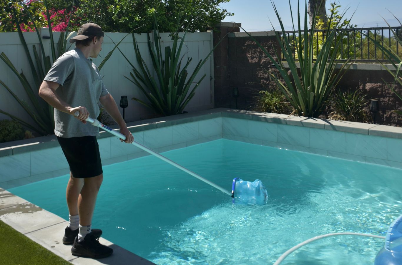 A Pool Service and Repair professional delivering pool service in Irvine, CA, showcasing the advantages of reliable local maintenance and repairs.